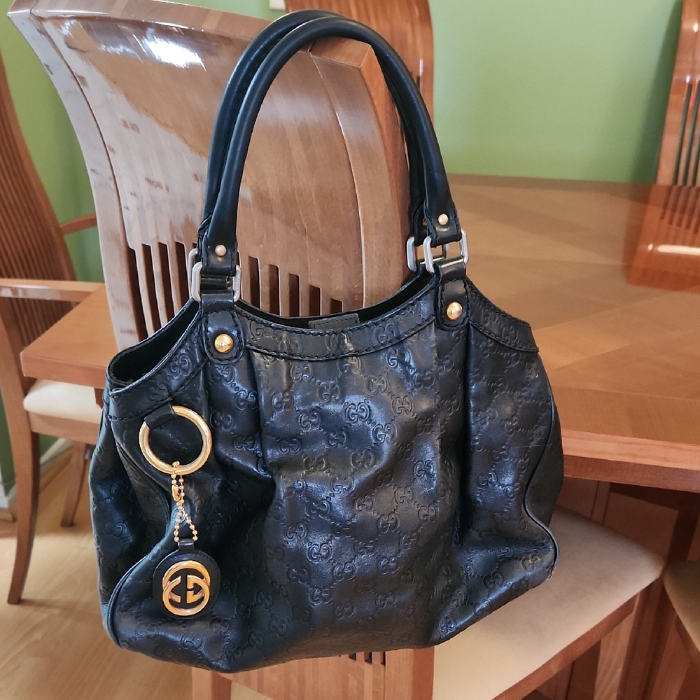 Gucci Black Shoulder Bag with Gold Accents
